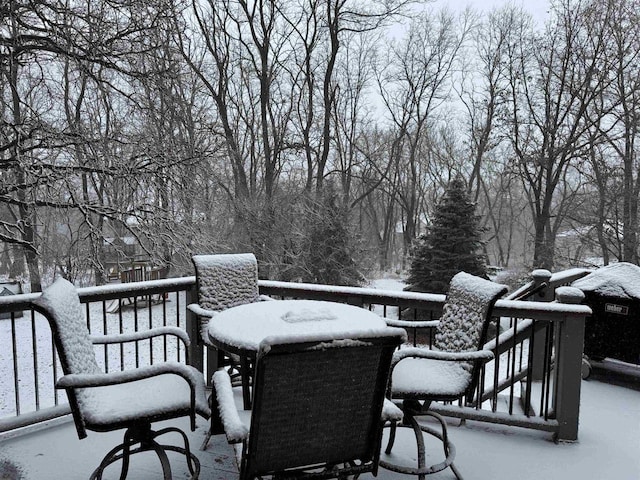 view of snow covered deck