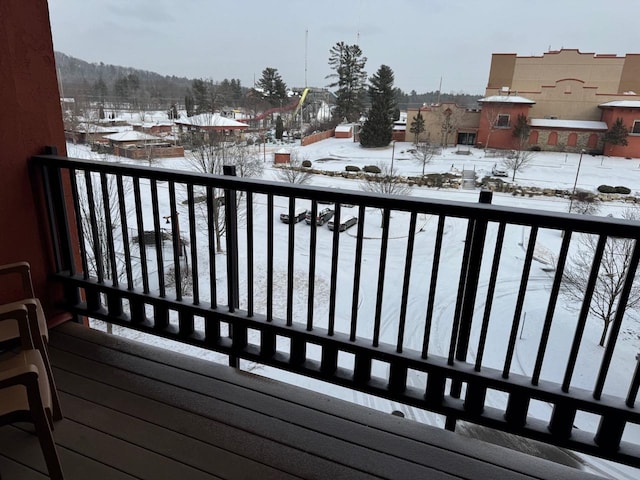 view of snow covered deck