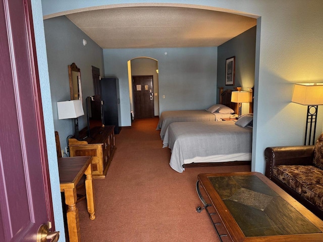 bedroom featuring light carpet