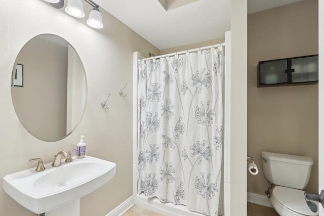 bathroom with toilet and sink