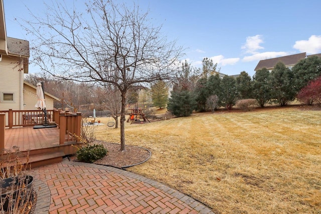 view of yard featuring a wooden deck