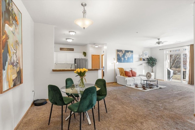 dining area with carpet