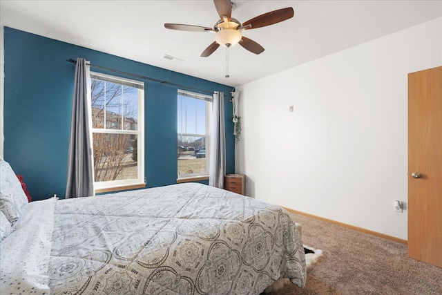 bedroom featuring ceiling fan and carpet floors