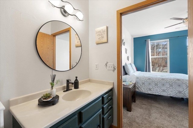 bathroom featuring ceiling fan and vanity