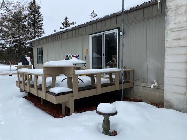 view of snow covered deck