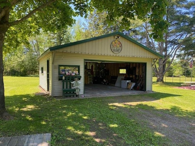 garage with a yard