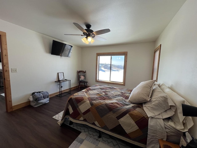 N8551 Lake Cabin Dr, New Lisbon, WI 53950 - bedroom with ceiling fan and dark hardwood / wood-style flooring