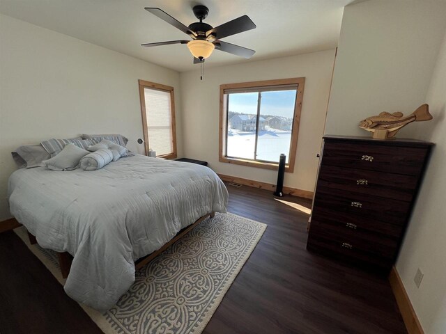 N8551 Lake Cabin Dr, New Lisbon, WI 53950 - bedroom with dark wood-type flooring and ceiling fan