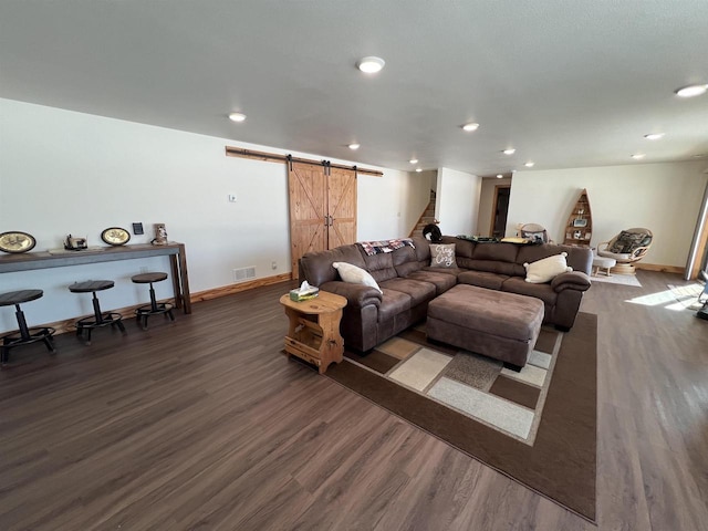 N8551 Lake Cabin Dr, New Lisbon, WI 53950 - living room with dark hardwood / wood-style flooring and a barn door