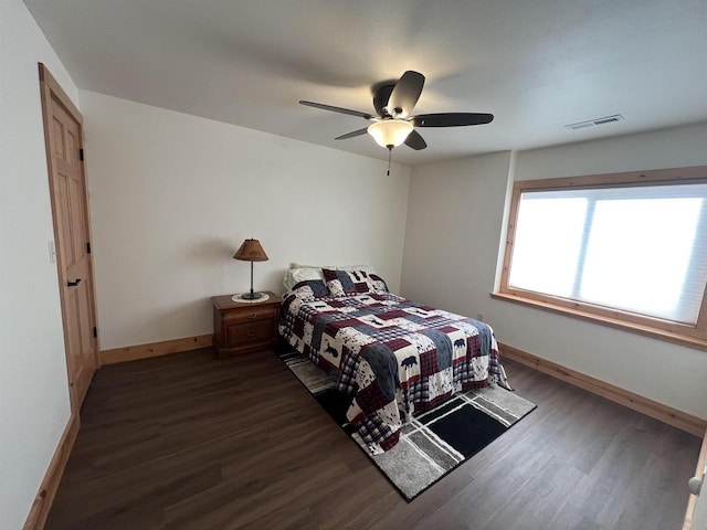 N8551 Lake Cabin Dr, New Lisbon, WI 53950 - bedroom with ceiling fan and dark hardwood / wood-style flooring