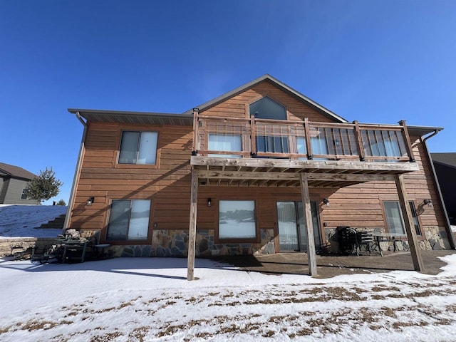 N8551 Lake Cabin Dr, New Lisbon, WI 53950 - snow covered back of property with a balcony