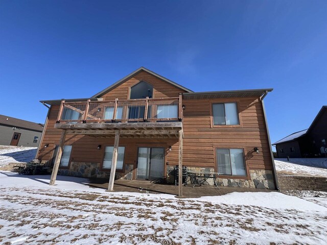 N8551 Lake Cabin Dr, New Lisbon, WI 53950 - snow covered back of property with a balcony