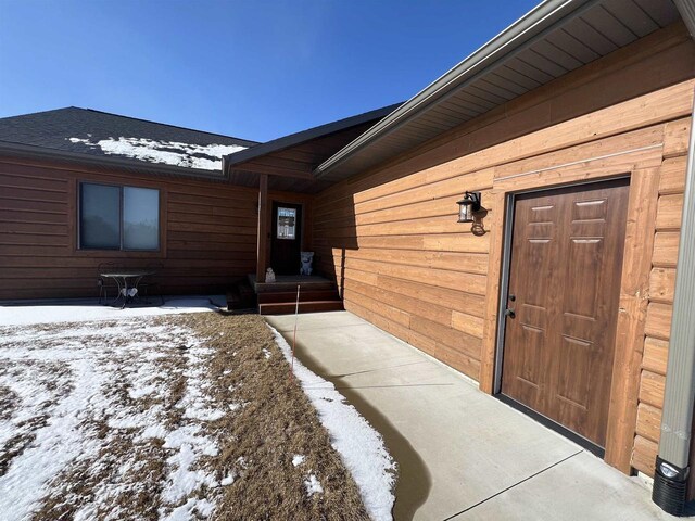 N8551 Lake Cabin Dr, New Lisbon, WI 53950 - view of snow covered property entrance