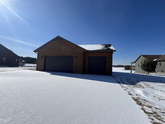 N8551 Lake Cabin Dr, New Lisbon, WI 53950 - view of snow covered garage