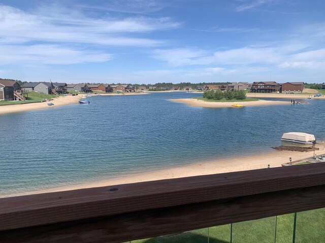 N8551 Lake Cabin Dr, New Lisbon, WI 53950 - property view of water with a beach view