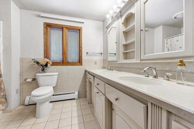 bathroom featuring tile patterned flooring, a baseboard radiator, and tile walls