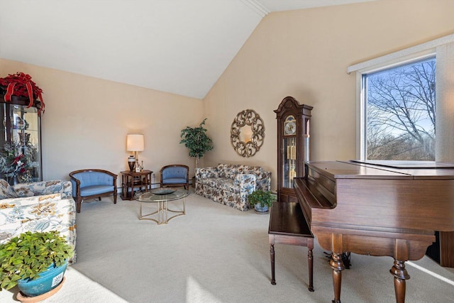 carpeted living room featuring vaulted ceiling