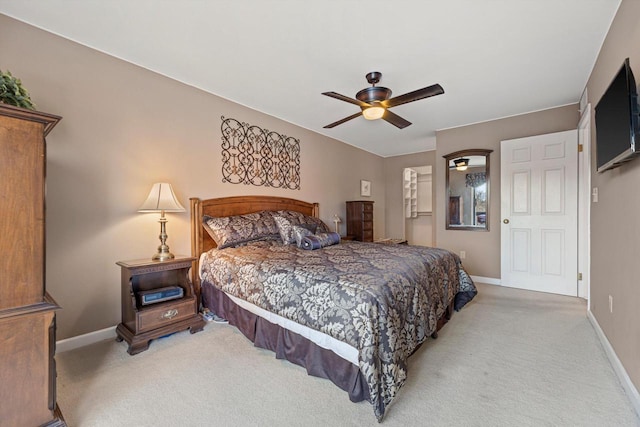 bedroom with ceiling fan and carpet flooring