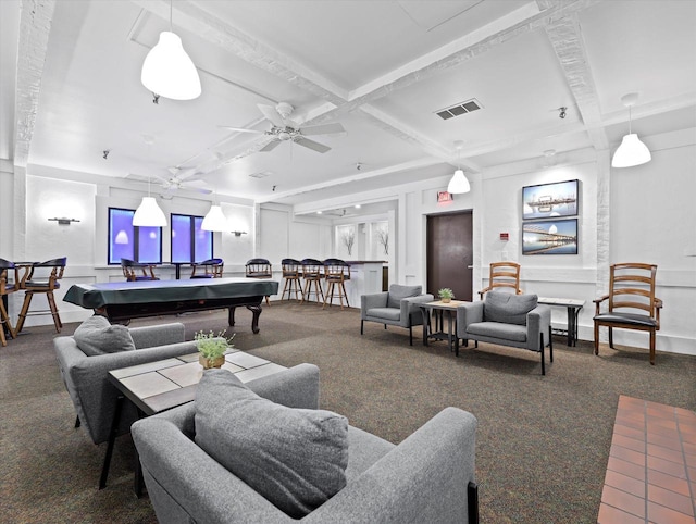 interior space with dark carpet, pool table, and beam ceiling