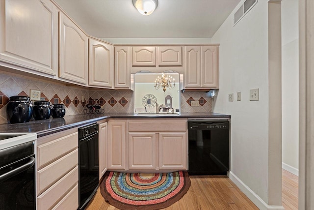 kitchen featuring sink, light hardwood / wood-style flooring, stove, black dishwasher, and decorative backsplash