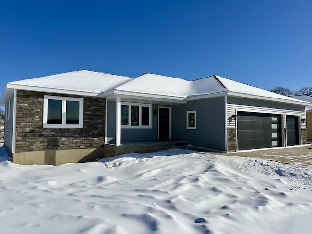 2935 Ridge View Dr, Portage, WI 53901 - ranch-style house featuring a garage