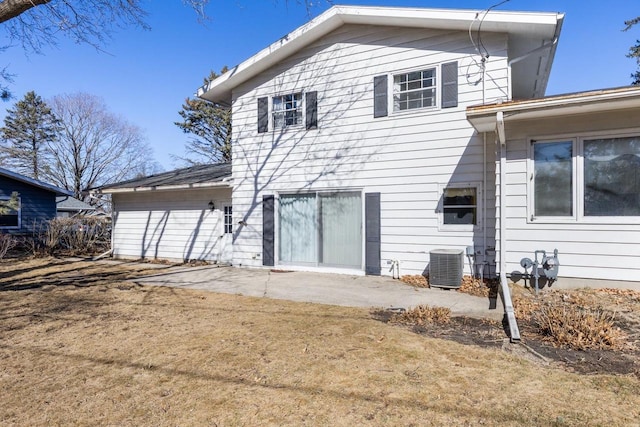 rear view of house featuring cooling unit