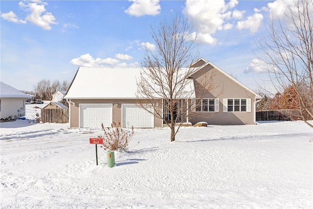 view of front of home with a garage