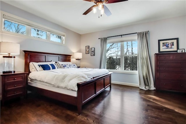 bedroom with dark wood-type flooring and ceiling fan