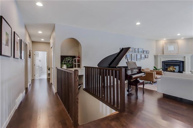 hallway featuring dark wood-type flooring