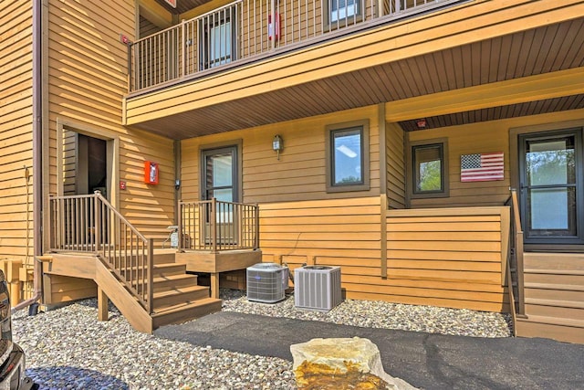 doorway to property with central air condition unit