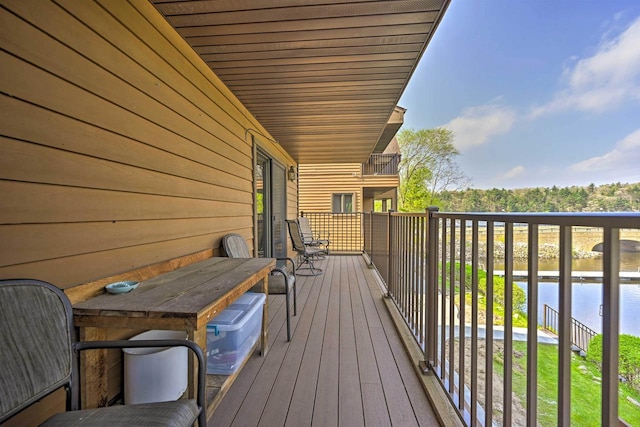 balcony featuring a water view