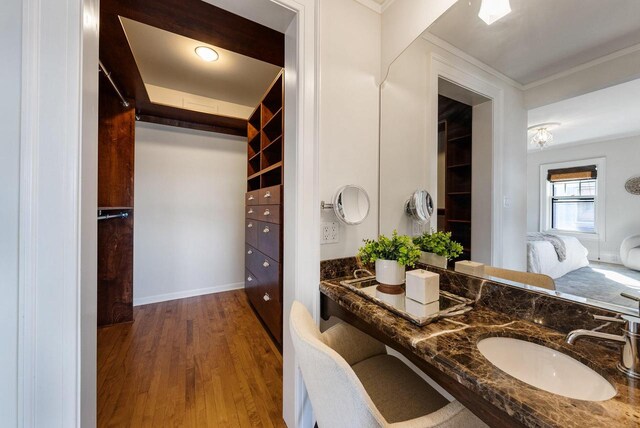 bathroom featuring sink and hardwood / wood-style flooring