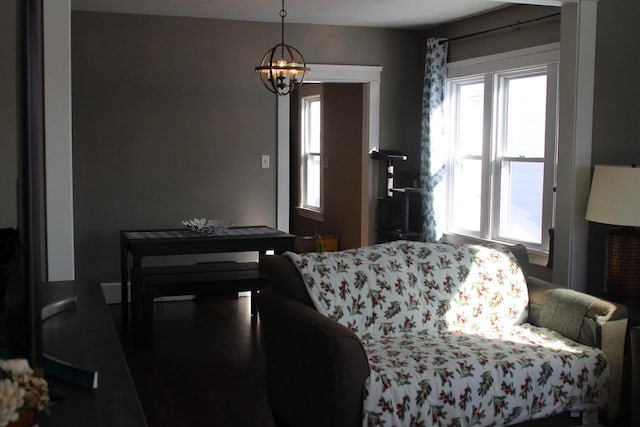 living room featuring an inviting chandelier and a wealth of natural light