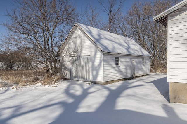 view of snow covered garage