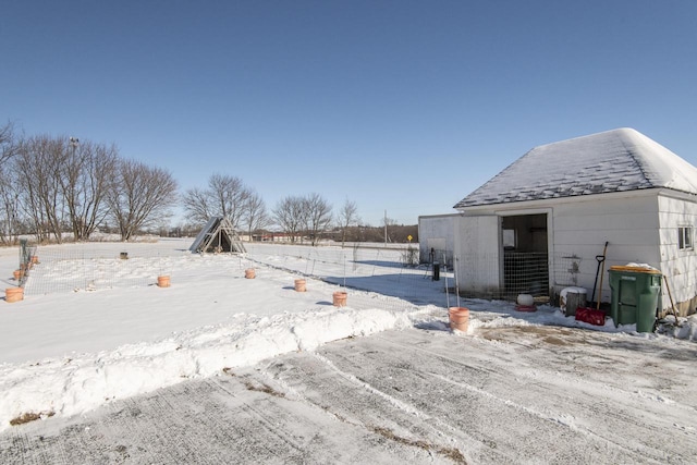 view of yard covered in snow