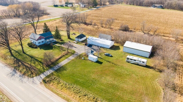 birds eye view of property featuring a rural view