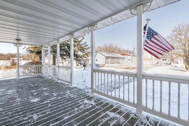 view of snow covered deck