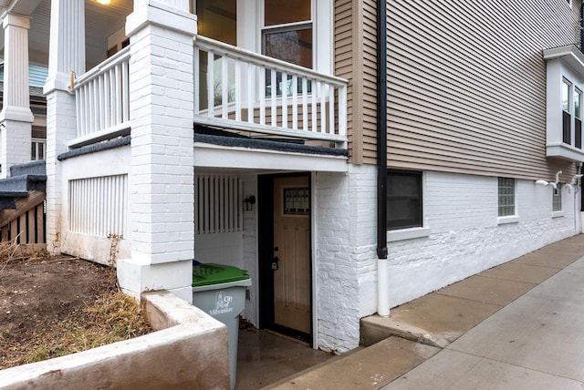 doorway to property with a balcony