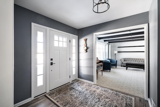 foyer entrance featuring hardwood / wood-style floors