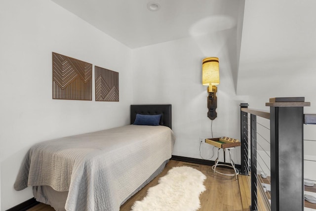 bedroom featuring hardwood / wood-style flooring