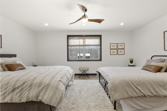 bedroom featuring wood-type flooring and ceiling fan