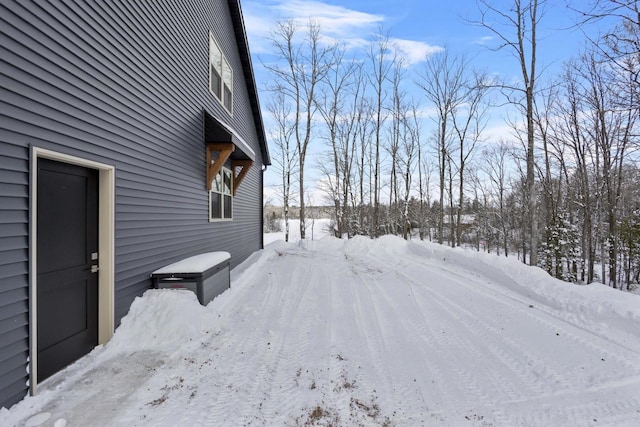 view of yard covered in snow