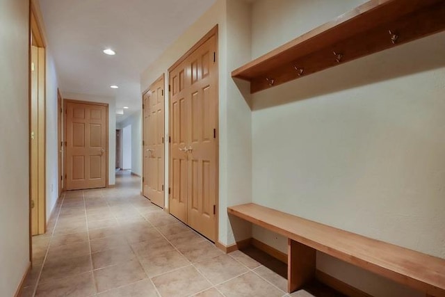 mudroom featuring light tile patterned floors