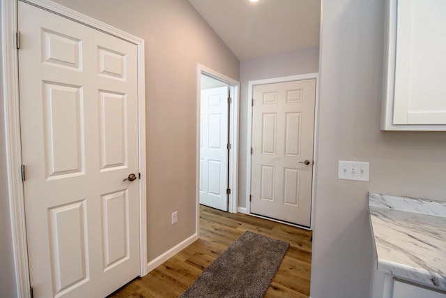 hall with light wood-type flooring