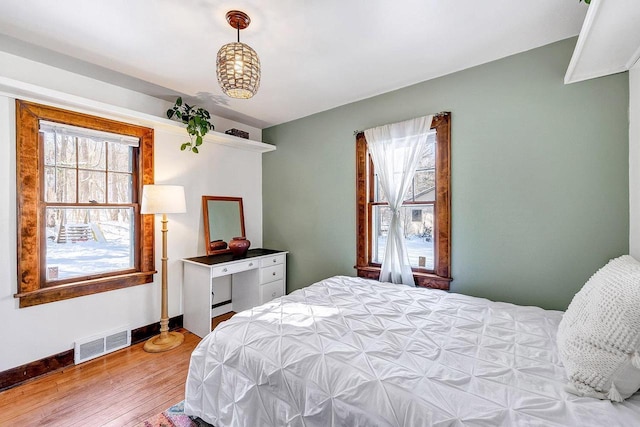 bedroom featuring hardwood / wood-style flooring