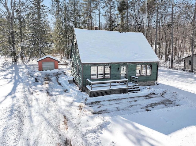 view of front of house with an outbuilding and a garage