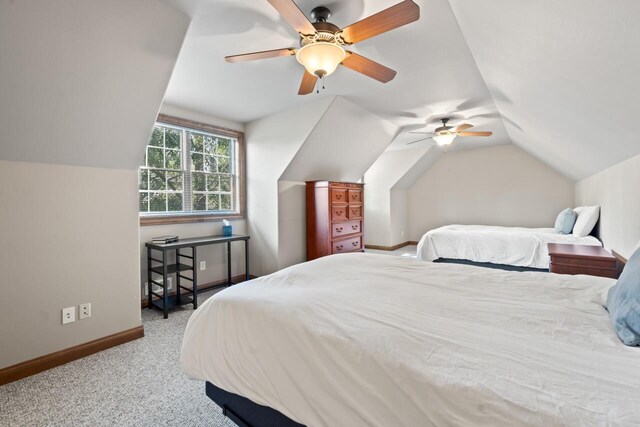 6507 Willow Ct, Waterford, WI 53185 - bedroom with vaulted ceiling, ceiling fan, and carpet floors