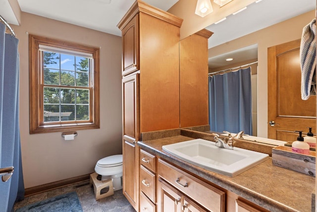 6507 Willow Ct, Waterford, WI 53185 - bathroom featuring vanity and toilet