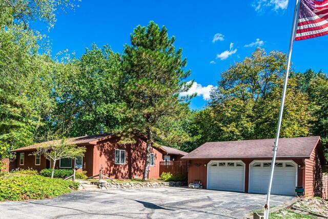 single story home with a garage