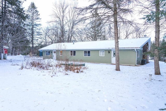 view of front of property featuring cooling unit